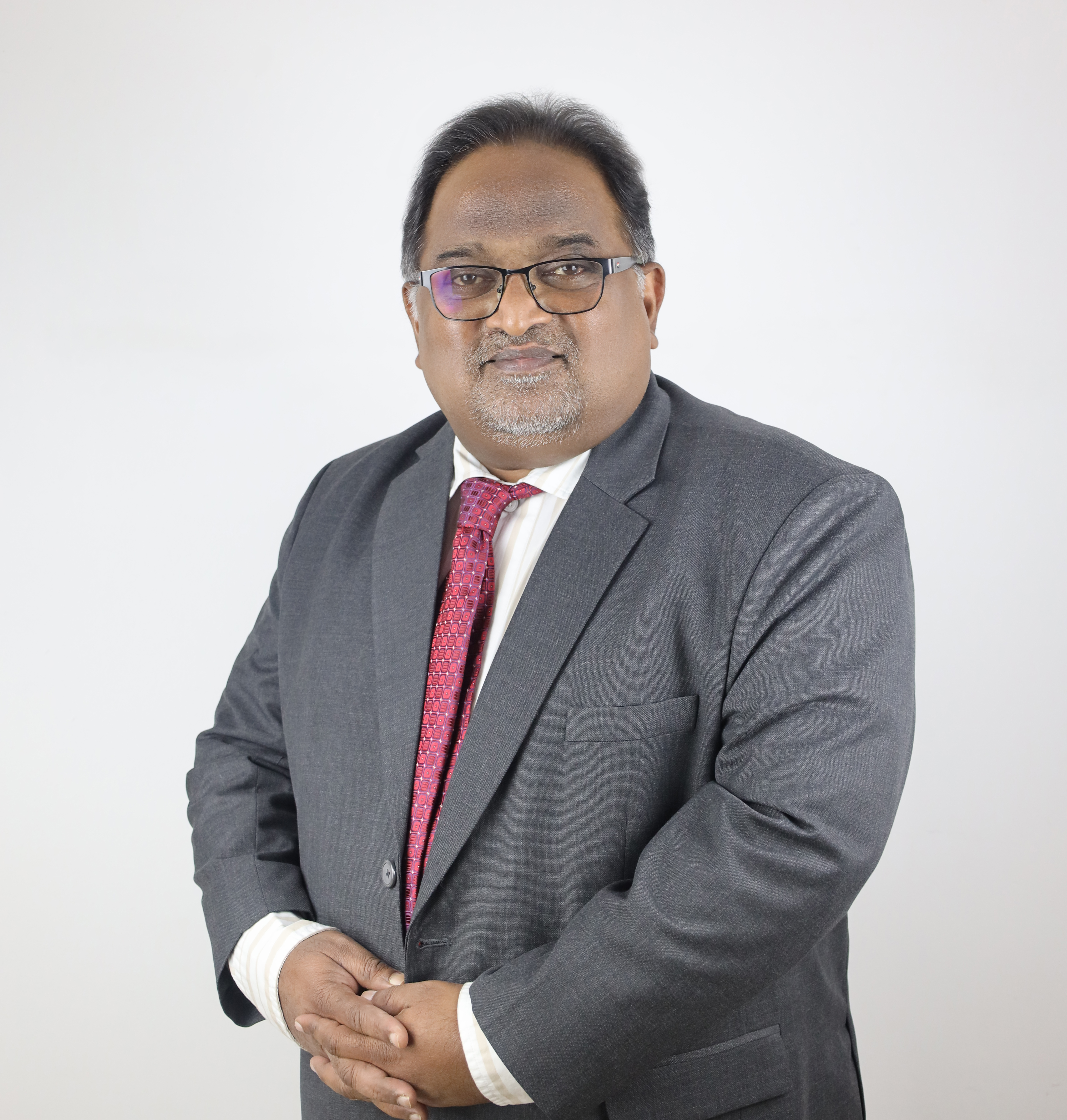 DR. MAMACHEN PAILY CHERIAN